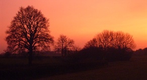 Sunset behind Belview Holiday Cottage Dorset